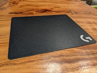 The hard-surface Logitech G440 on a wooden table, one of the alternatives compared in the source roundup. Image: Future.
