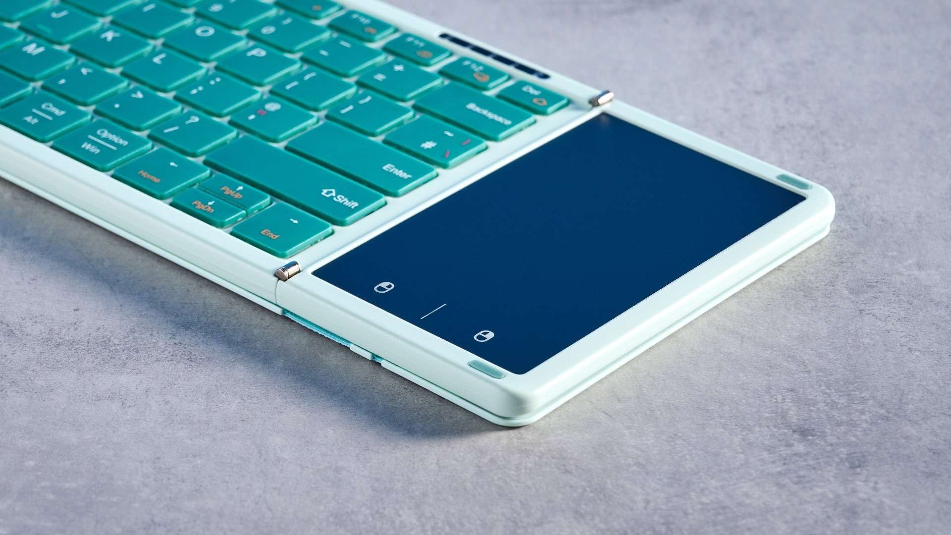 The Seenda folding keyboard's right-hand touchpad section and adjacent hinge. Image: Ashley Thieme / Future.
