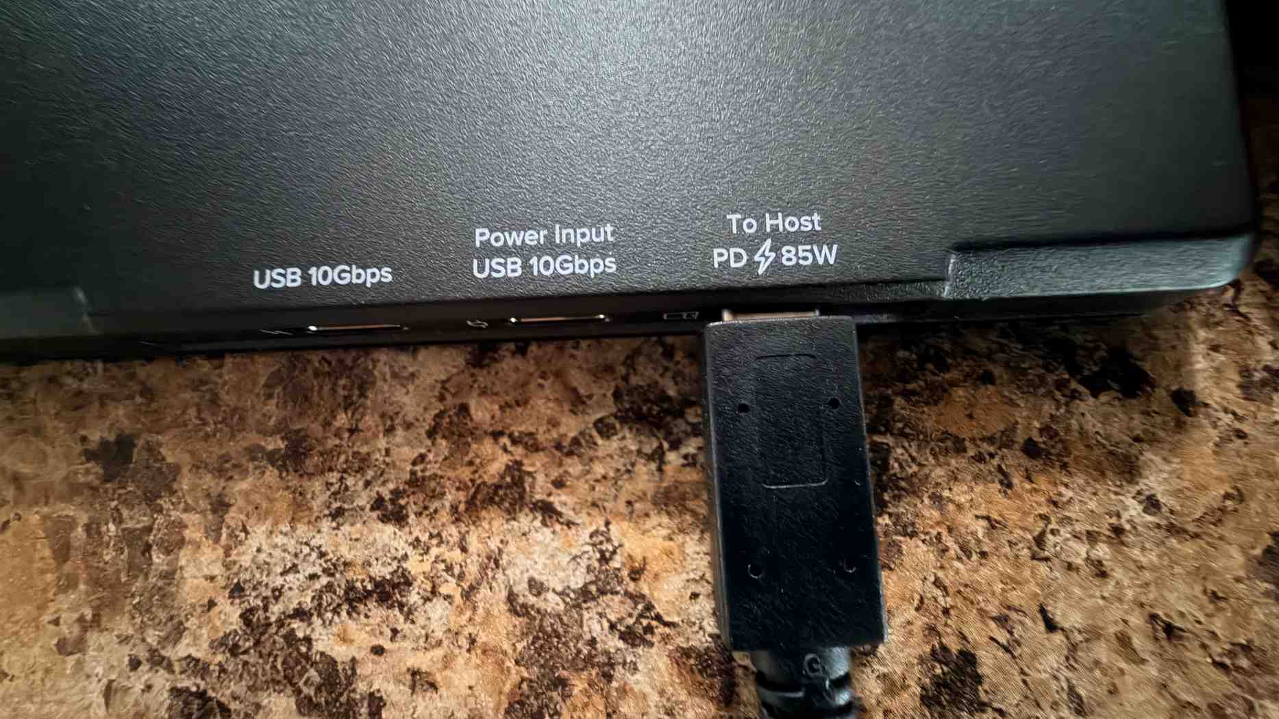 The Plugable monitor ports, showing the connected host lead beside the power-input and USB data labels. Image: Future.