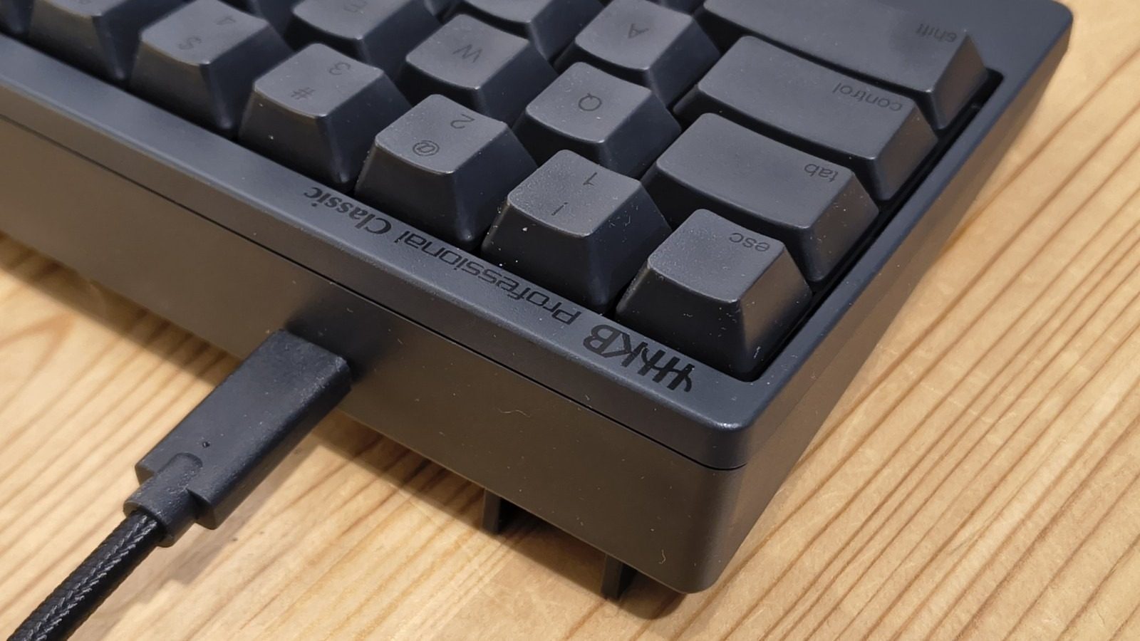 The HHKB Professional Classic Type-S rear USB-C connection with a cable attached. Image: Mark Pickavance / Future.