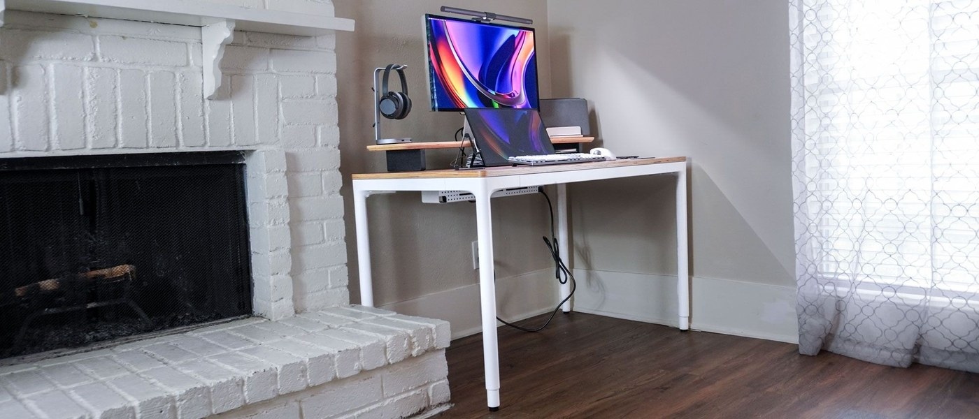 A Four-Leg Standing Desk With Controls in the Surface