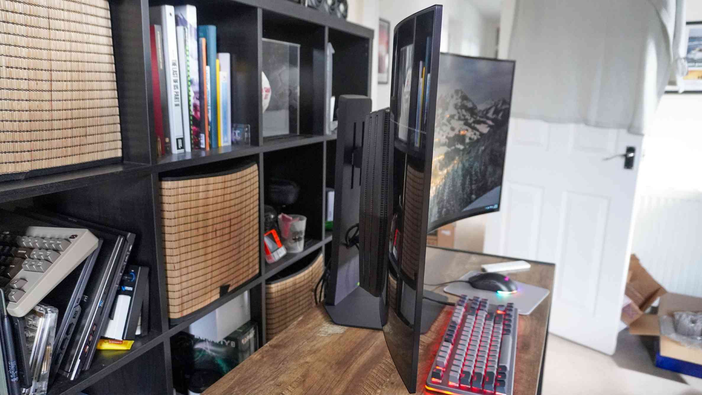 A side view of the LG UltraGear 45GX90SA installed on a desk, showing the depth occupied by the curved panel and its support. Image: Tom's Guide.