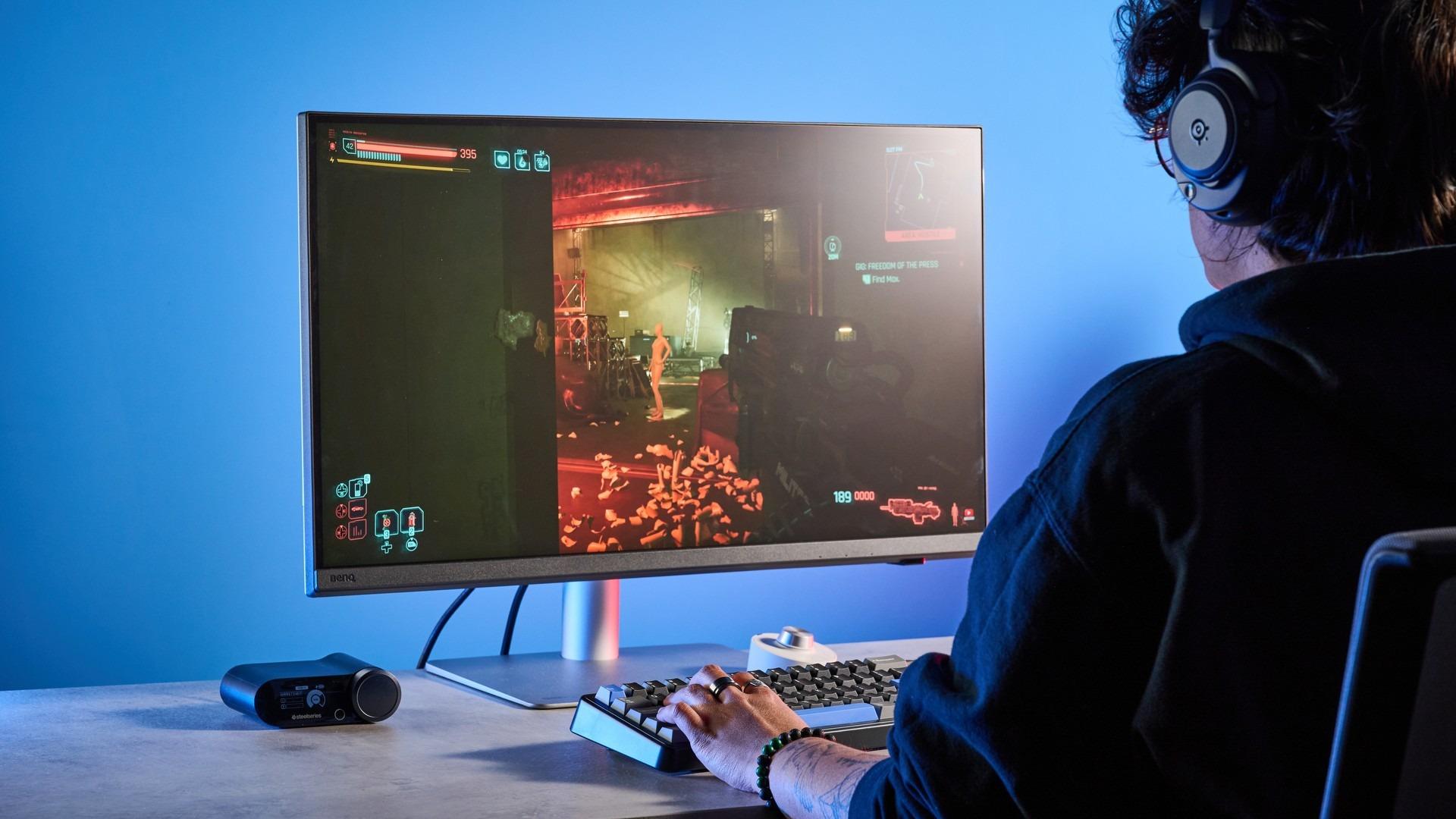 The BenQ PD2730S in a desk arrangement pictured in the source review. Image: Tom's Guide.