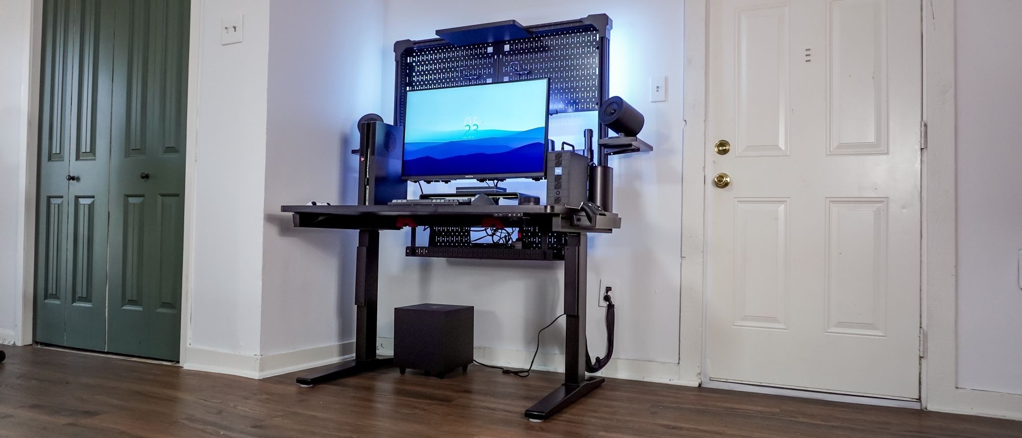 Use a Rear Rail to Reposition a Monitor Arm