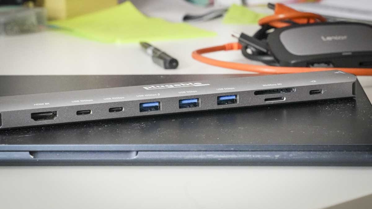 The Plugable hub port row, with its HDMI, USB data connections and card slots visible beside connected accessories. Image: Future.