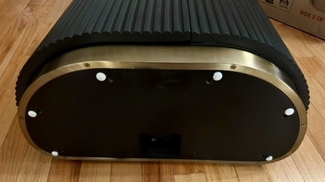 A decorative Opal cabinet component laid on its side during unpacking, showing its fluted exterior and underside. Image: Collin Probst / Future.