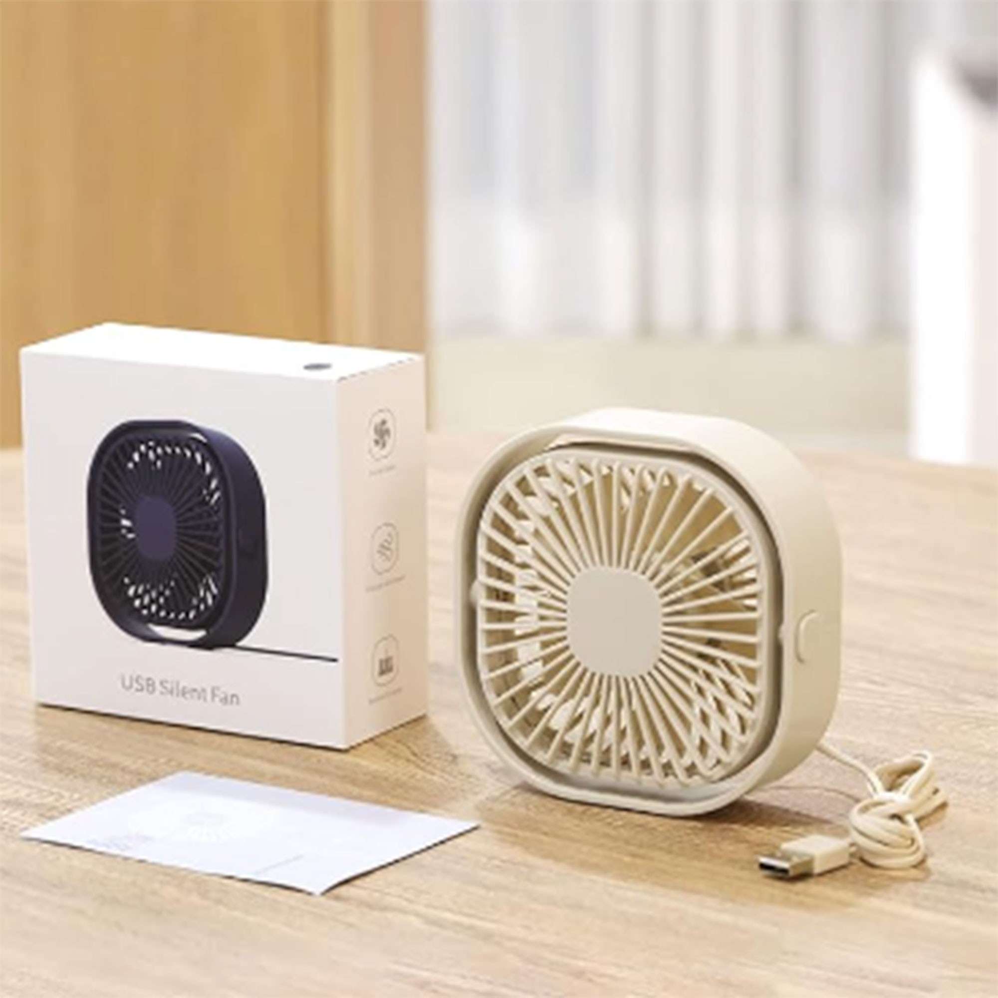 The continuously USB-powered desk fan beside its packaging and input lead, representing the fixed-position option in the comparison. Source product image: Future.