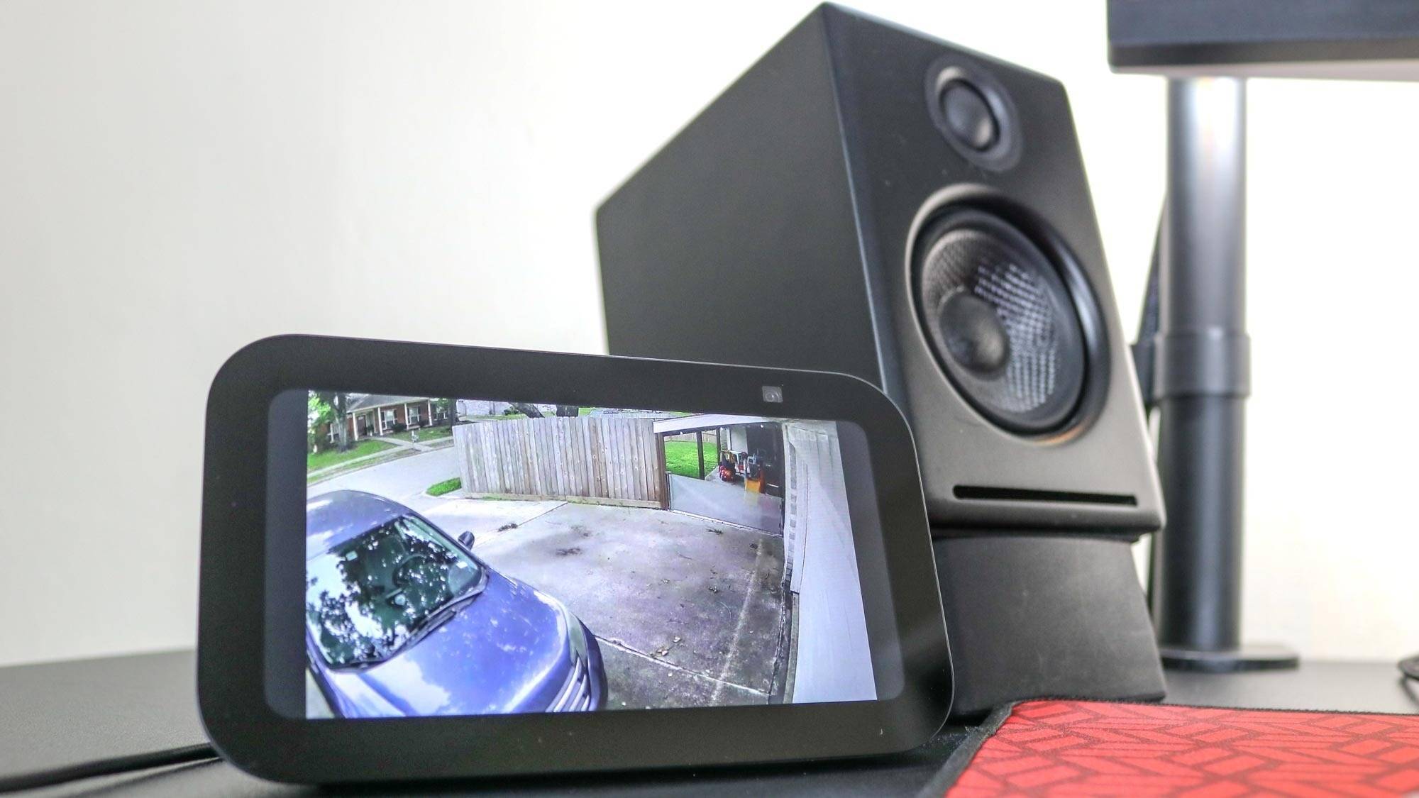 A security-camera feed displayed on the Echo Show 5 in the source's desk arrangement. Image: Tom's Guide.