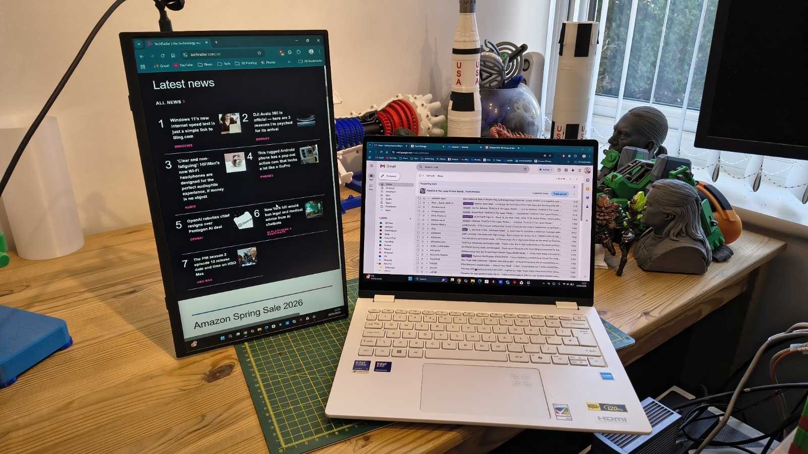 The UPerfect Ufree V in portrait orientation beside a laptop on the review desk. Image: Mark Pickavance / Future.