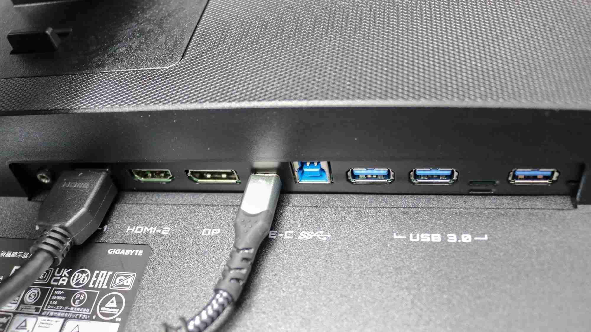 The rear connection panel of a Gigabyte M28U shown in the source, illustrating separate video and USB connections. Image: Tom's Guide.