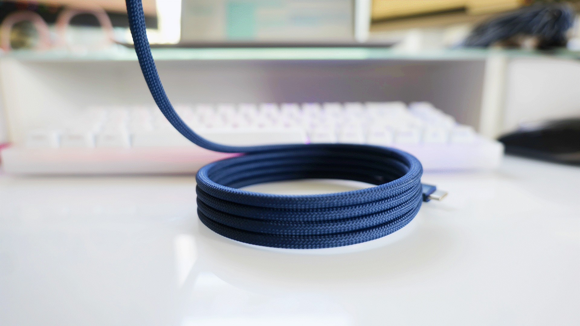 A Magnetic Cable Sleeve Keeps Spare Charging Length in a Coil